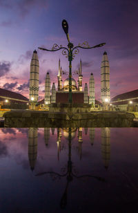 Reflection of illuminated buildings in water