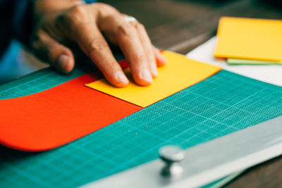 Cropped image of man working at table