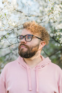 Portrait of young man looking away