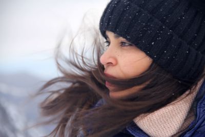 Close-up of woman in snow