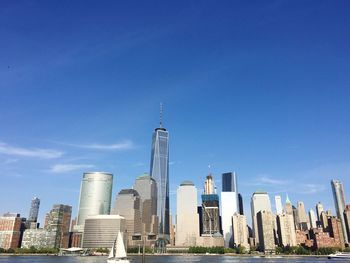 Modern cityscape against blue sky