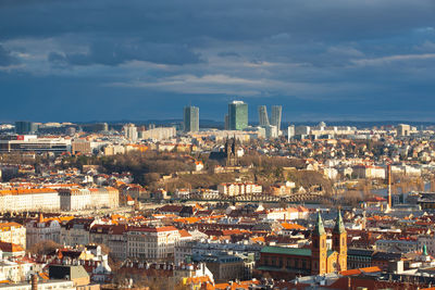 High angle view of buildings in city against sky