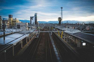 High angle view of railroad station against sky