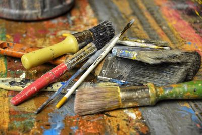 High angle view of paintbrushes on table