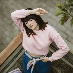 High angle view of woman standing outdoors