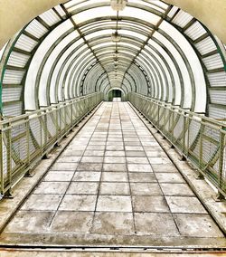 Empty footbridge in tunnel