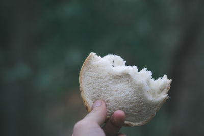 Close-up of hand holding ice cream