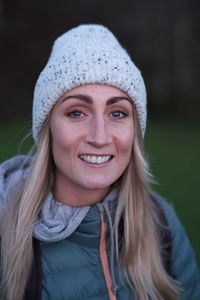 Portrait of a smiling young woman in winter