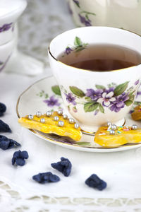 Tea cup served with christmas cookies