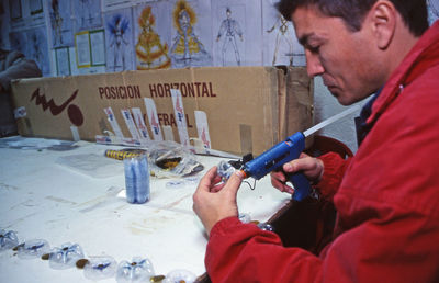 Side view of man working