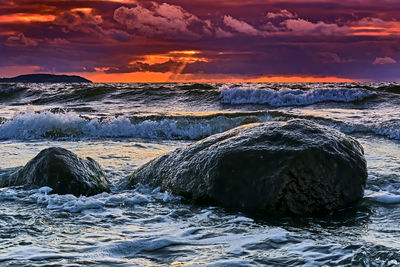 Scenic view of sea against sky during sunset