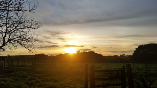 Scenic view of landscape at sunset