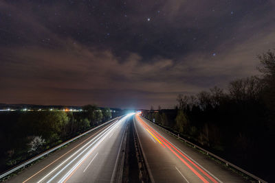 Light trails on road at night