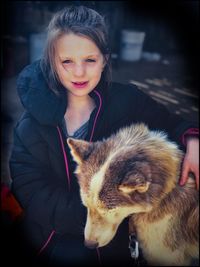 Portrait of cute girl with cat