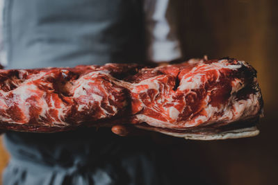 Close-up of person preparing food