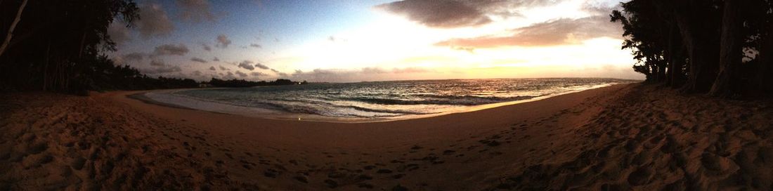 Scenic view of sea at sunset