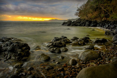 Scenic view of sea against sky during sunset