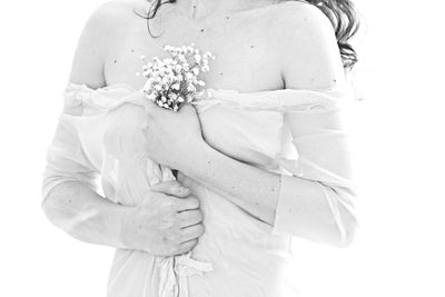 Close-up of woman wearing white background