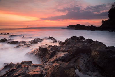 Scenic view of sea against sky during sunset