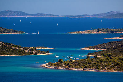 Scenic view of sea against blue sky