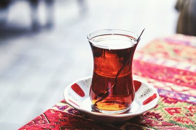 Close-up of tea in glass on table