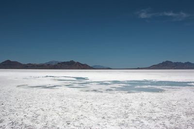 Panoramic view of salt lake in salt lake city, against blue sky