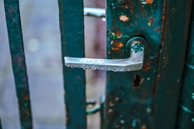 Close-up of rusty metal gate