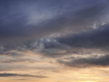 Low angle view of dramatic sky during sunset