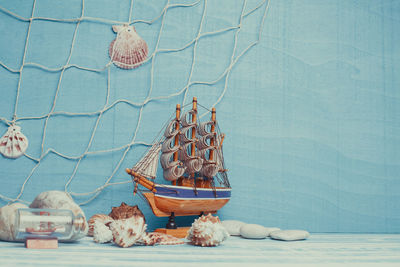 High angle view of crab in basket on table against wall