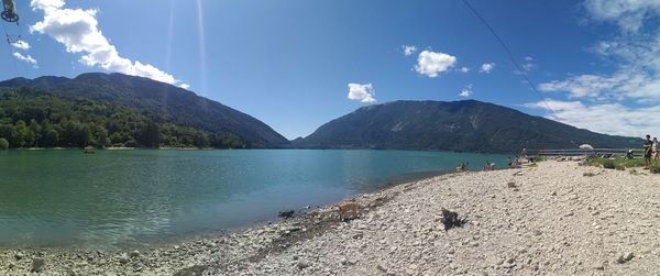 Panoramic view of lake and mountains against sky