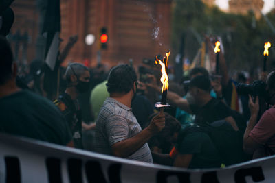 Group of people in front of fire