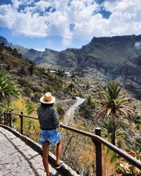 Rear view of woman looking at mountain