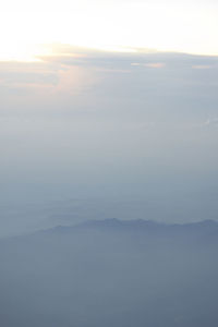 Scenic view of mountains against sky during sunset