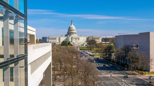 Road passing through buildings in city