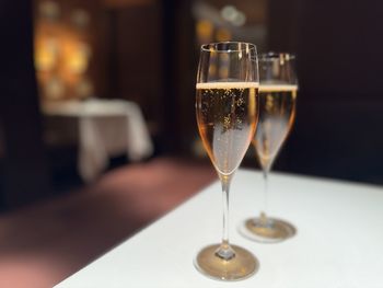 Close-up of wineglass on table