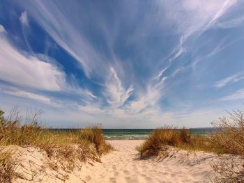 Scenic view of beach against sky