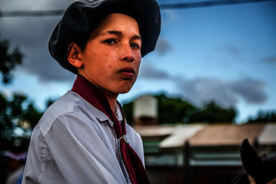 Portrait of teenage boy wearing uniform