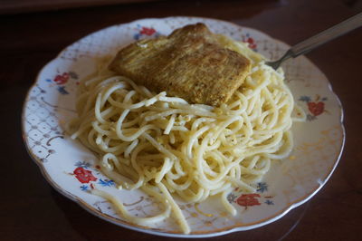 Close-up of noodles served in plate