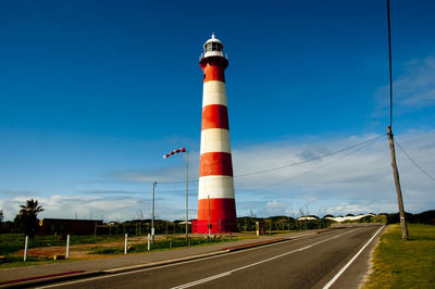 View of lighthouse against blue sky