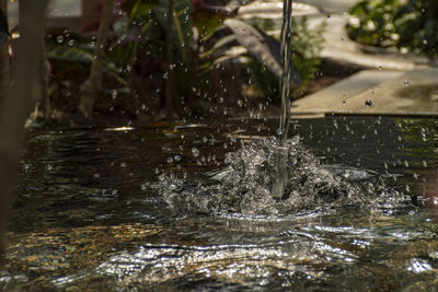 Close-up of water splashing in lake