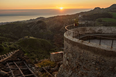 High angle view of castle against sky during sunset