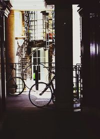 Silhouette bicycle parked outside building