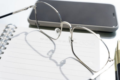 Close-up of eyeglasses on table