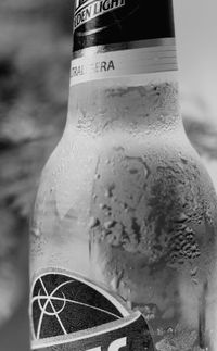 Close-up of beer glass bottle