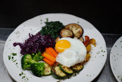 Close-up of breakfast served in plate