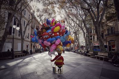 View of multi colored umbrella on street