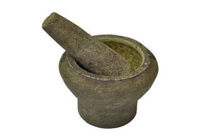 Close-up of statue against white background