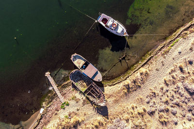 High angle view of abandoned boat on road