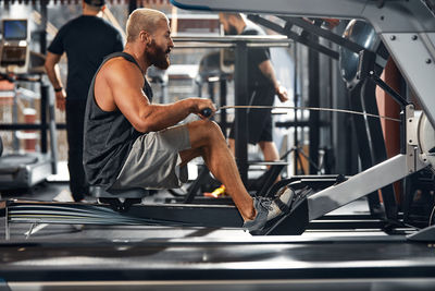 Man exercising in gym