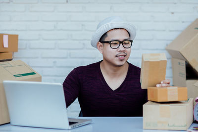 Portrait of man using mobile phone